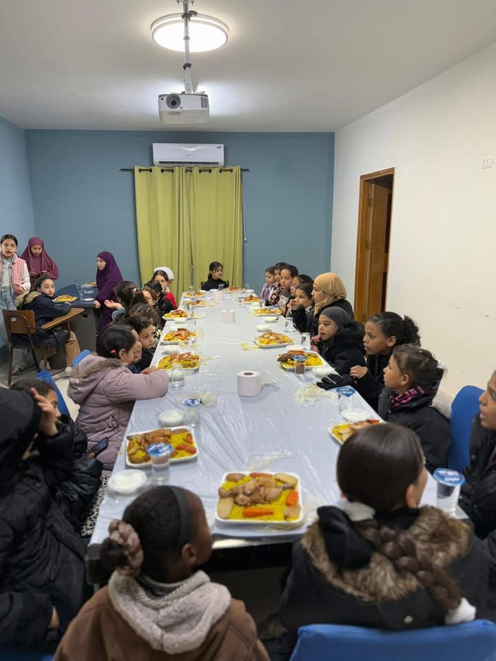 Organizing a group breakfast for children during the month of Ramadan.