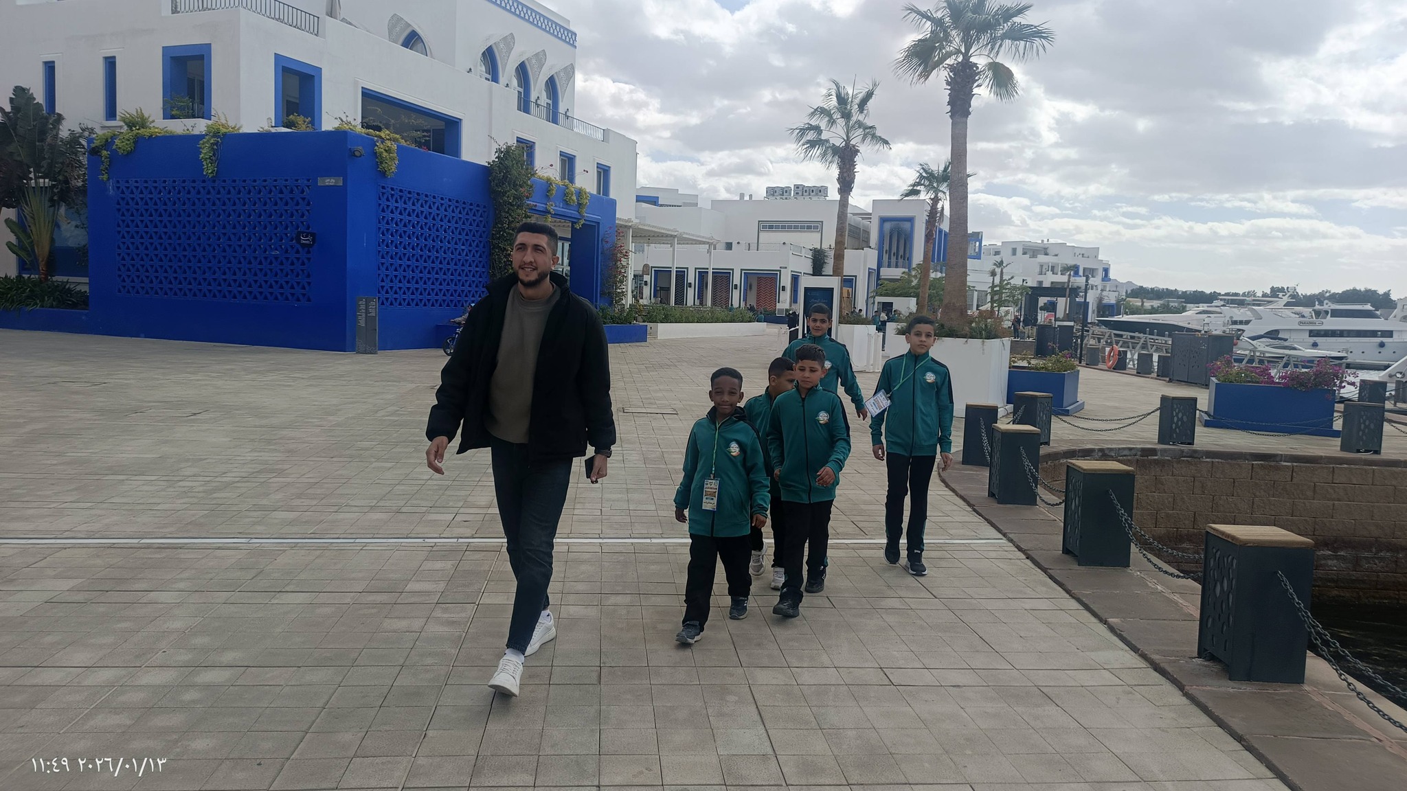 The orphaned children are walking around and playing in Aylia City in Aqaba. - 4