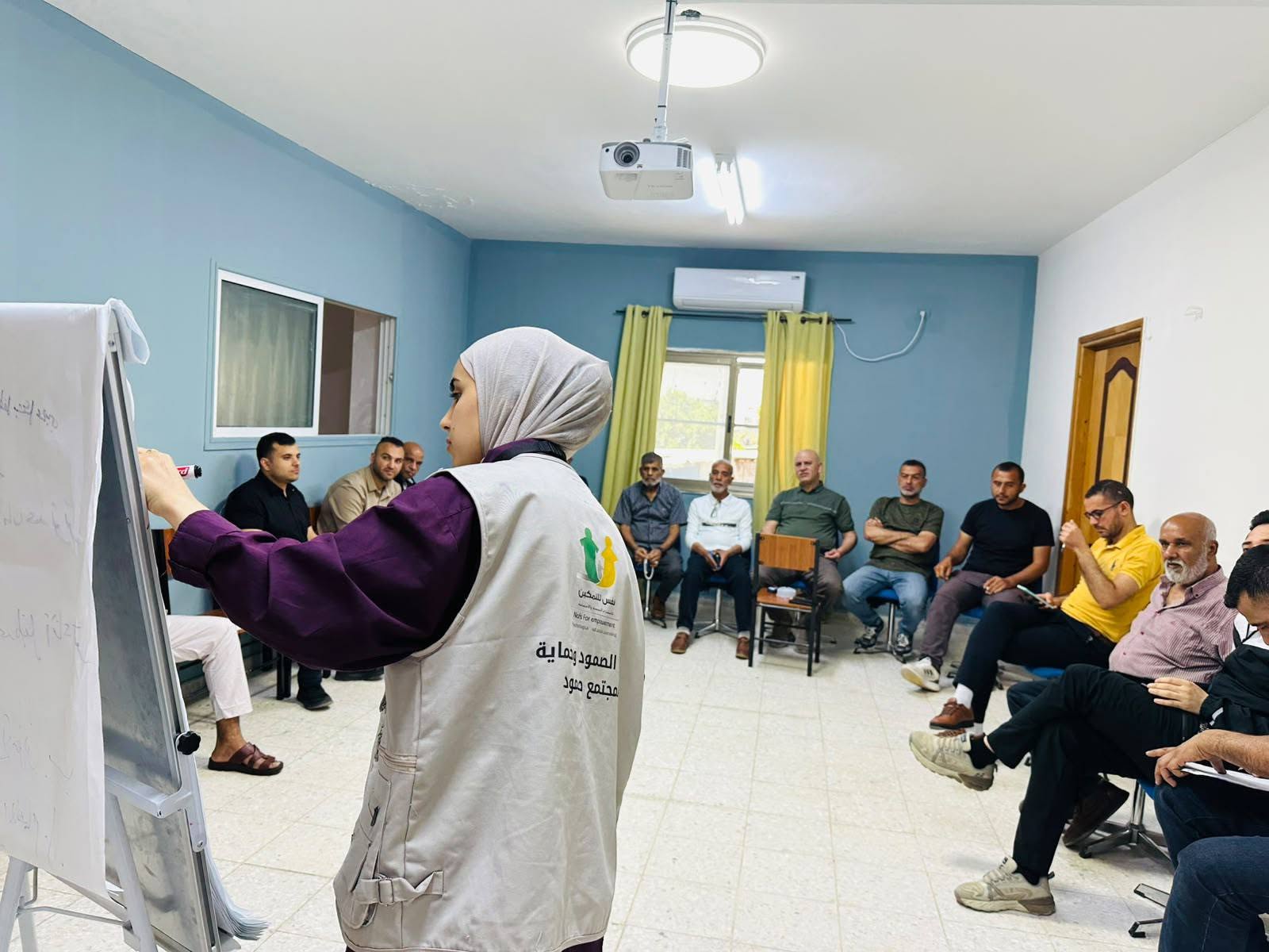 An awareness-raising session targeting men