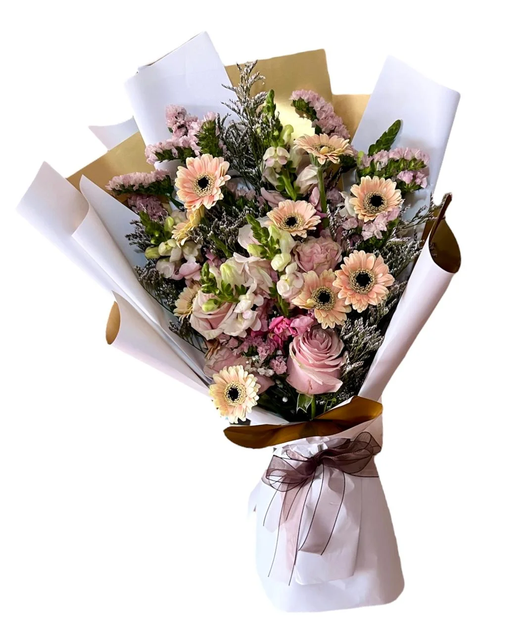 Flores En Ramo Encanto Rosa: Gerberas, Rosas Y Follajes — Celebraciones. Arreglo floral de Flores Les Roses con envío a domicilio en Bogotá.