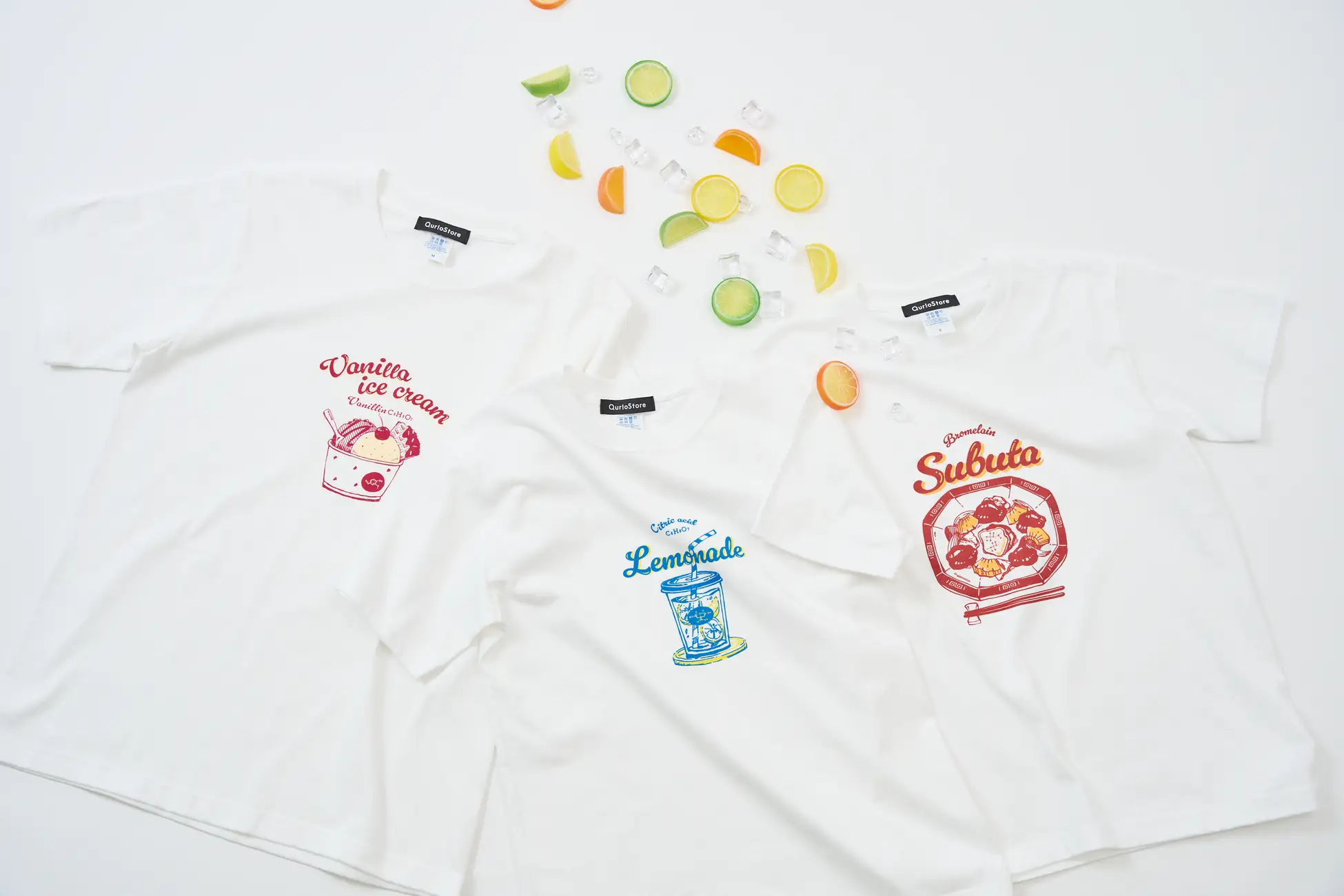 伊沢拓司 企画のデザインも! 通販サイト「QurioStore」から、食べ物と化学のモチーフをポップにデザインした新作Tシャツが登場しましたの画像