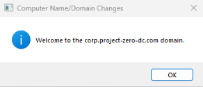 Successful domain join confirmation for project-zero-win-client , enabling users like John Doe to authenticate against the domain controller.
