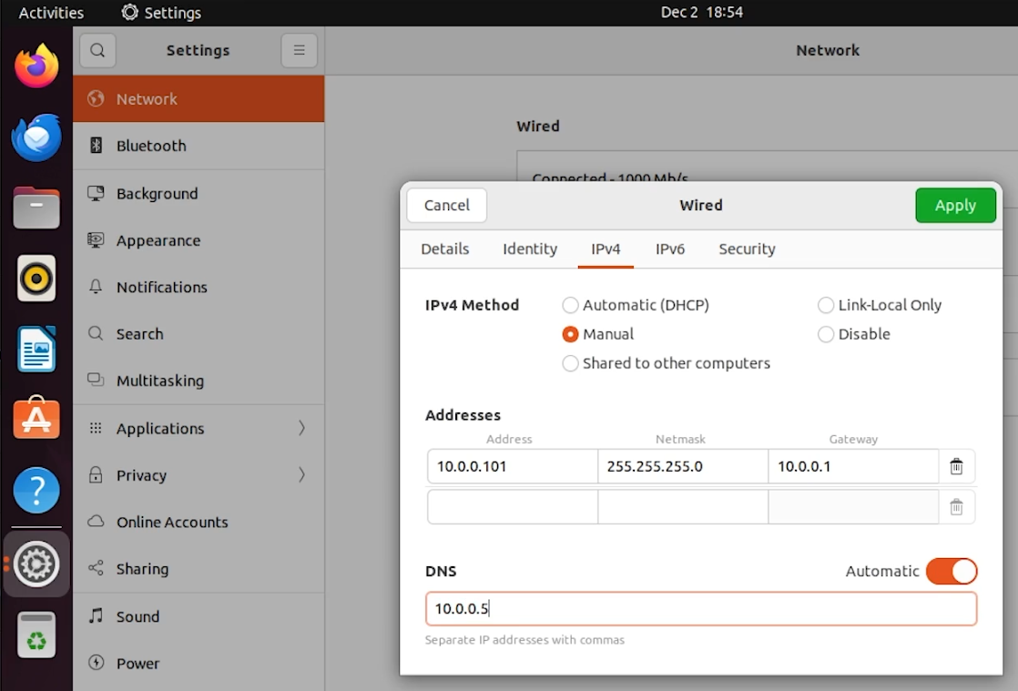 Ubuntu desktop configured with a static IP on the 10.0.0.0/24 subnet and DNS set to the Windows domain controller, ensuring reliable connectivity for domain lookups and authentication.